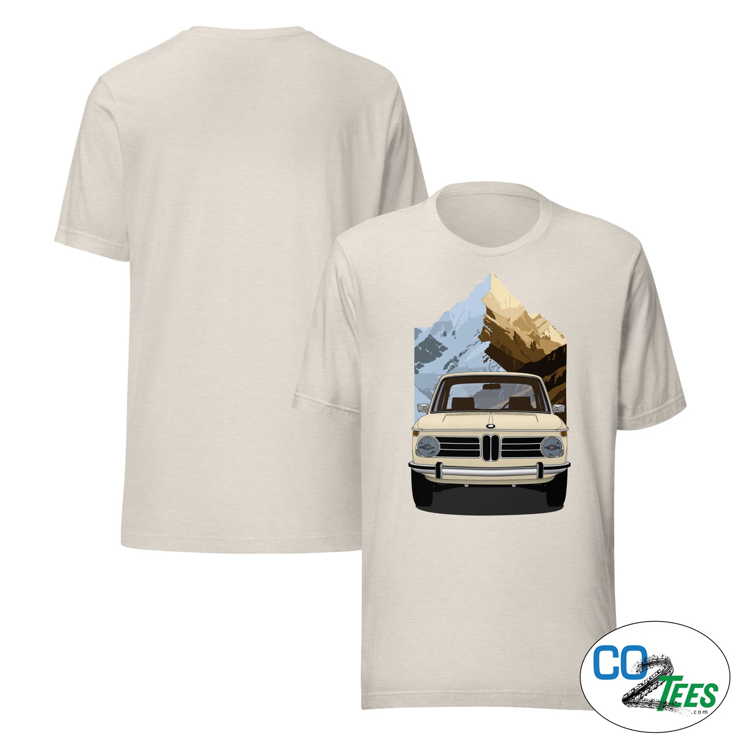 Beige t-shirt with a graphic of a vintage car and mountain landscape on a white background