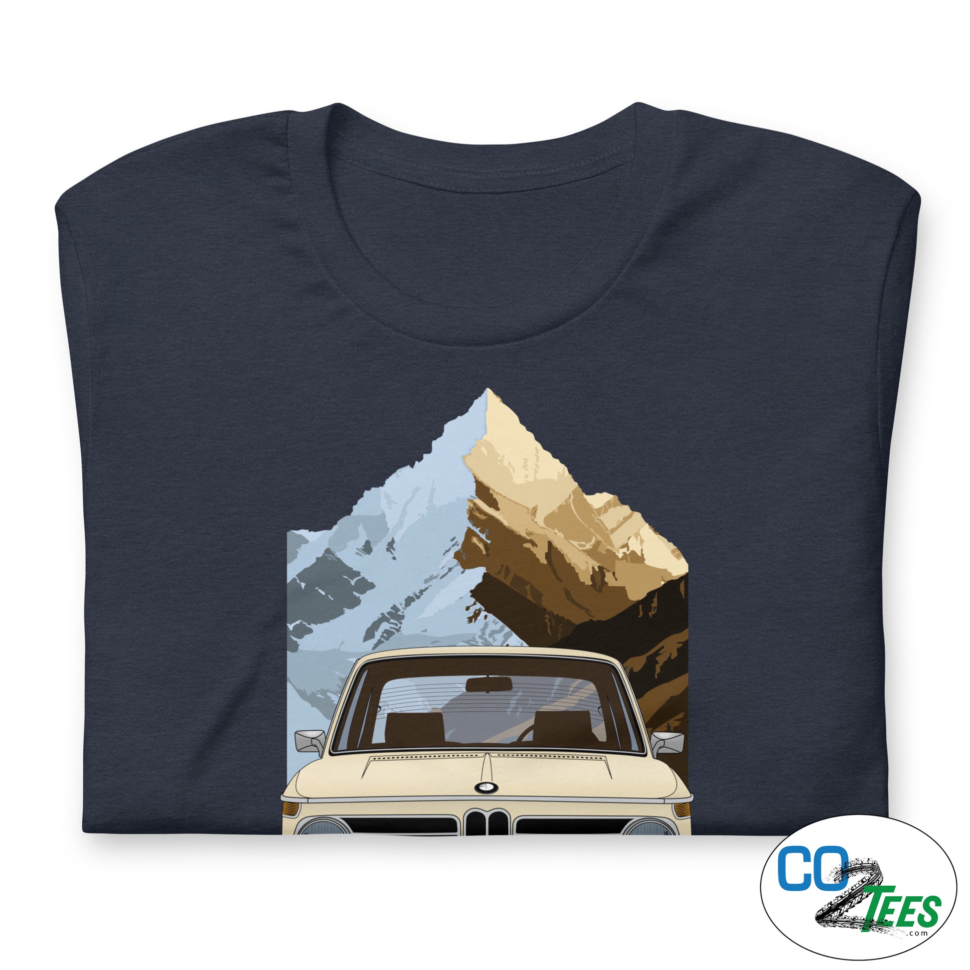 Navy blue t-shirt with a graphic of a car and mountains on a white background