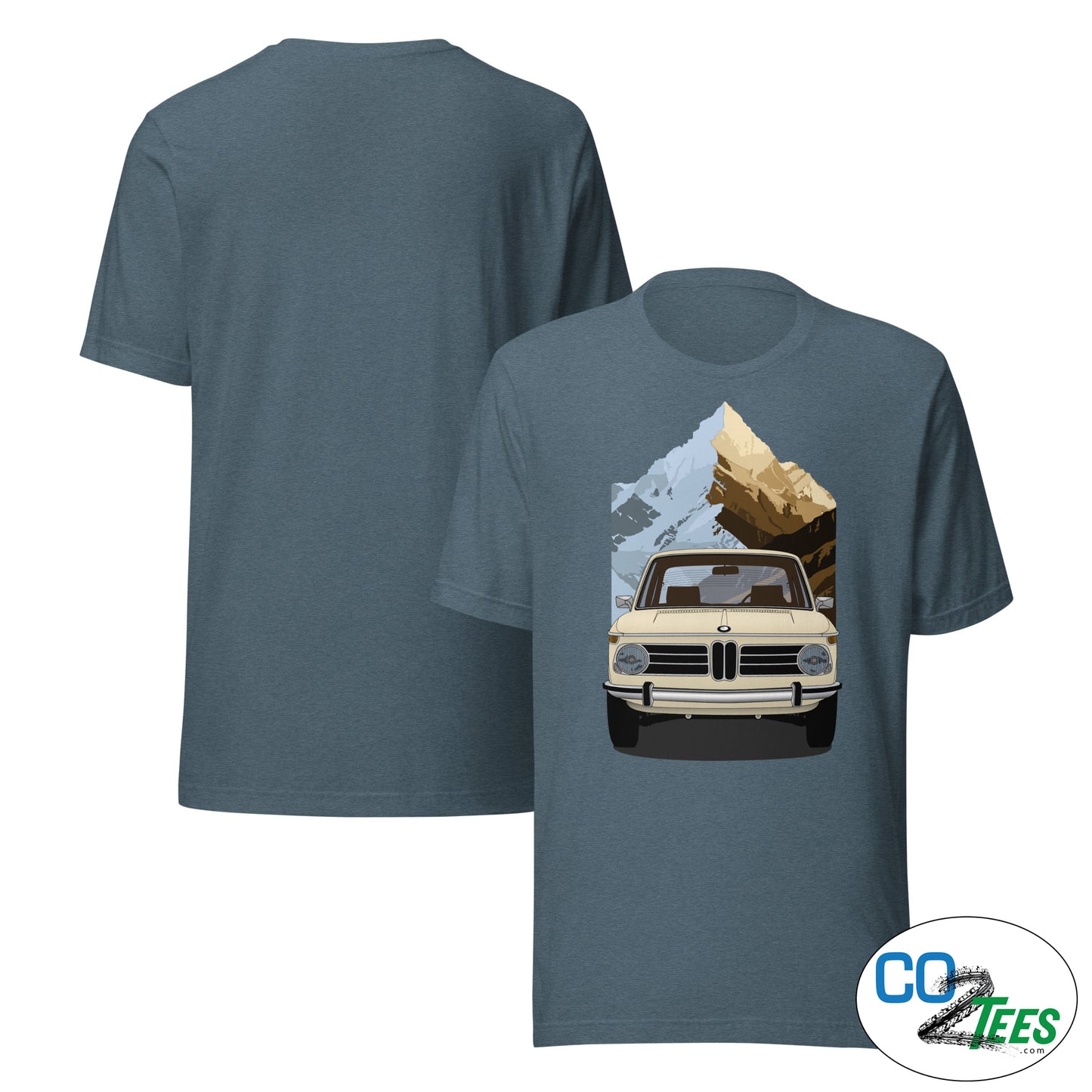 Blue t-shirt with a graphic of a vintage car and mountain on the front, displayed on a white background.