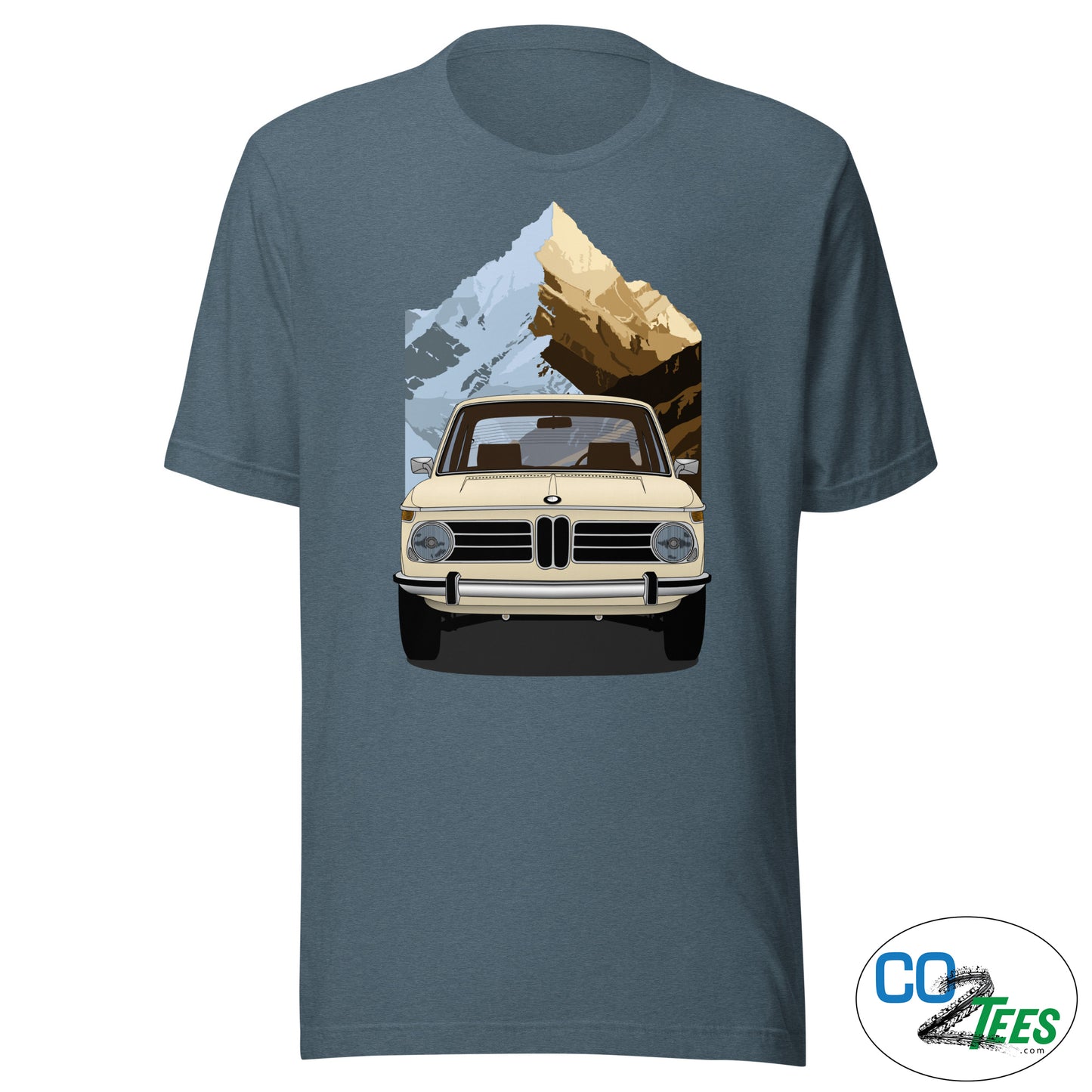 Blue t-shirt with a graphic of a vintage car and mountains on a white background